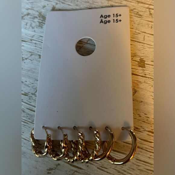 3 NEW! Gold Tone Hoop Earrings NWT

New with tags - Picture 1 of 7